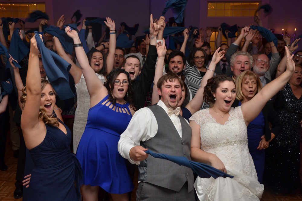 A group of people that are standing up A group of people that are standing up