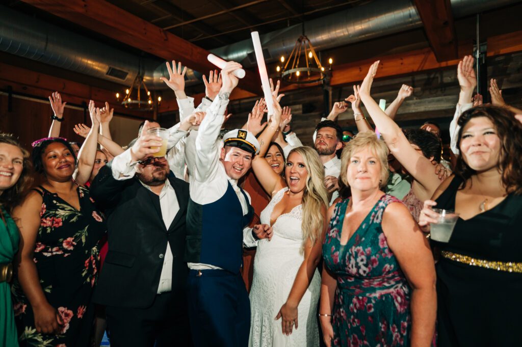 A group of people that are standing up A group of people that are standing up