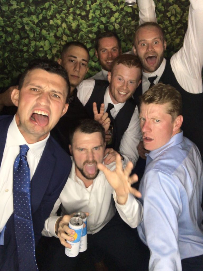 A group of men in suits and ties posing for the camera. A group of men in suits and ties posing for the camera.