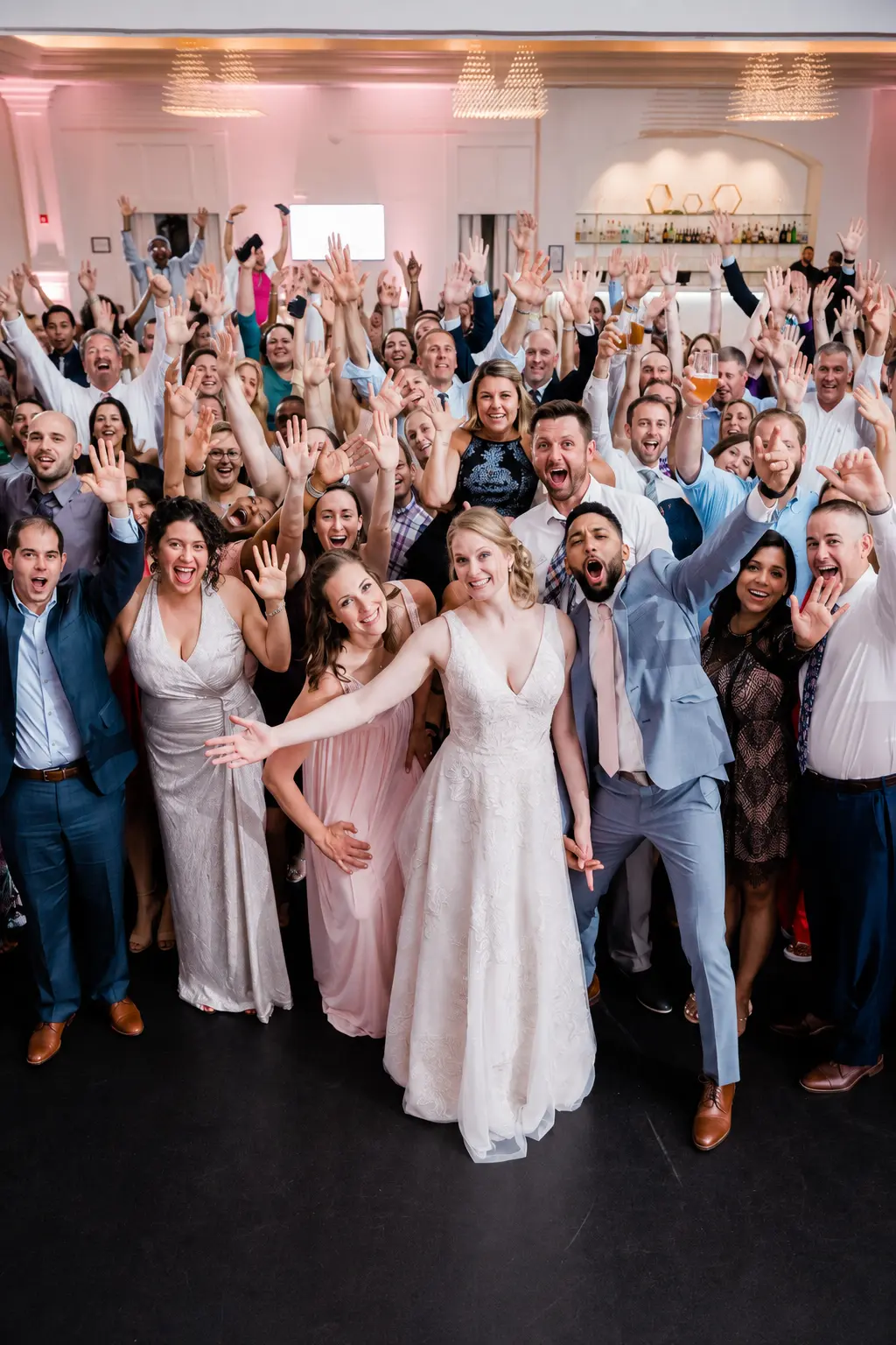 A group of people standing in front of each other.