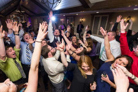 A group of people that are standing up in the air