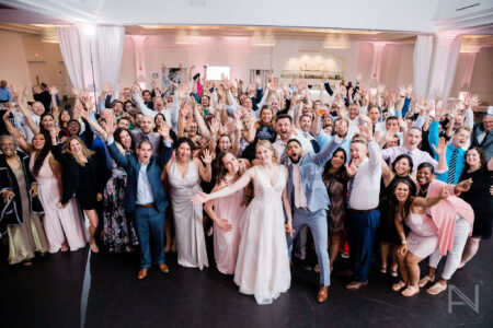 A group of people standing in front of each other.