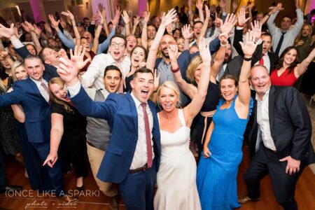 A group of people standing in front of each other.