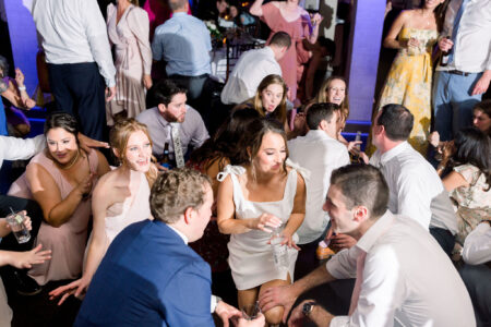 A group of people sitting around in a room.