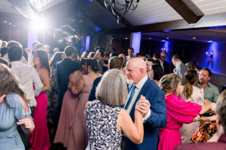 A couple of people that are dancing in the room