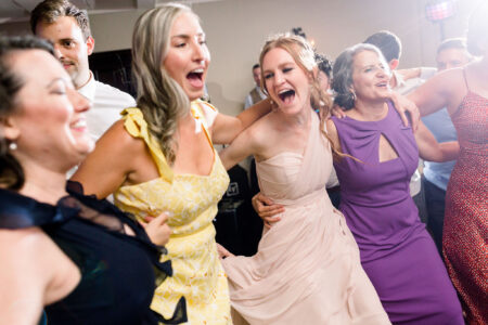 A group of people that are dancing together