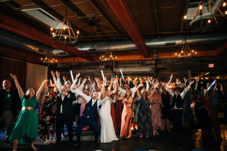 A group of people standing in front of each other.